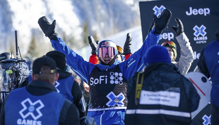 Canada's Mark McMorris raises his arms after seeing his winning score from this third run in the men's snowboard slopestyle final at the X Games on Saturday, Jan. 26, 2019, in Aspen, Colo.