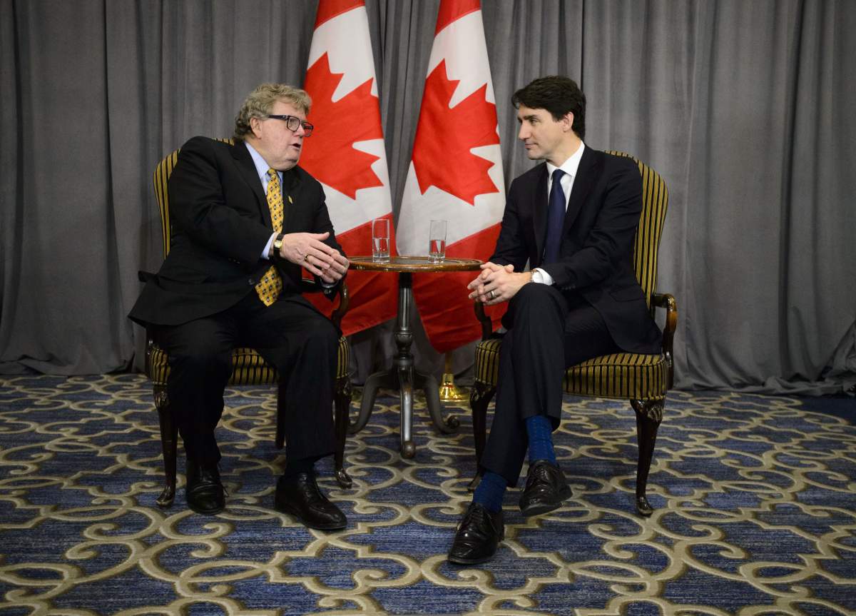 Prime Minister Justin Trudeau meets with London Mayor Ed Holder on the sidelines of the Federation of Canadian Municipalities' Big City Mayors' Caucus in Ottawa on Monday, Jan. 28, 2019. 