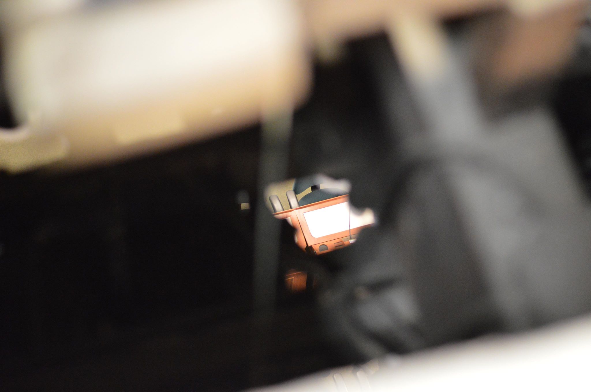 Peering through a vent in the attic of the Nova Scotia legislature allows our camera to see the legislative chamber below.