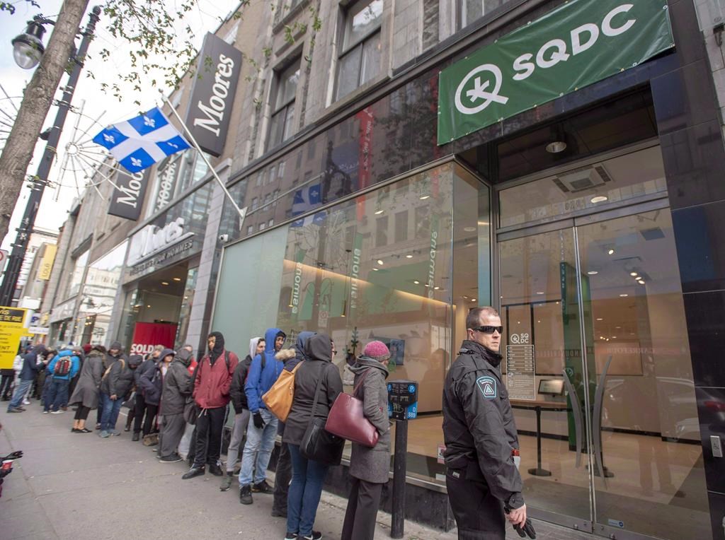 Customers line up at a government cannabis store in Montreal on Oct. 18, 2018.