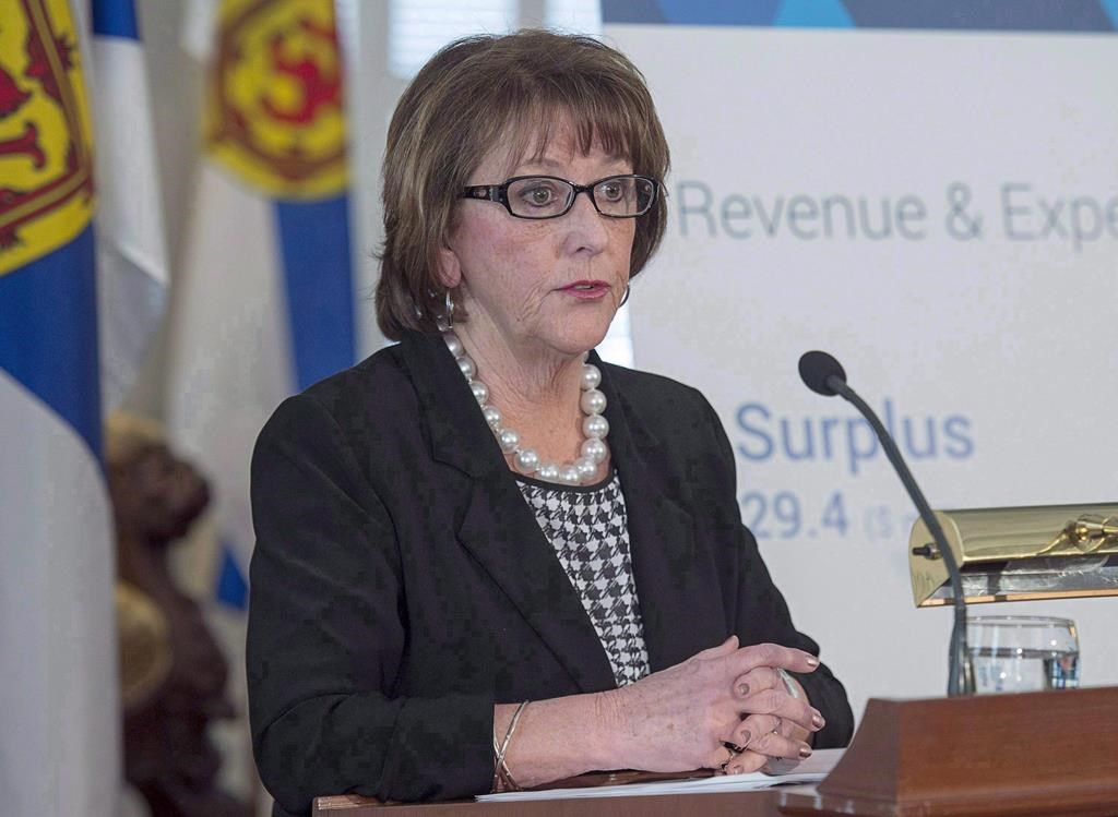Nova Scotia Finance Minister Karen Casey briefs reporters before she tables the budget at the legislature in Halifax on Tuesday, March 20, 2018.