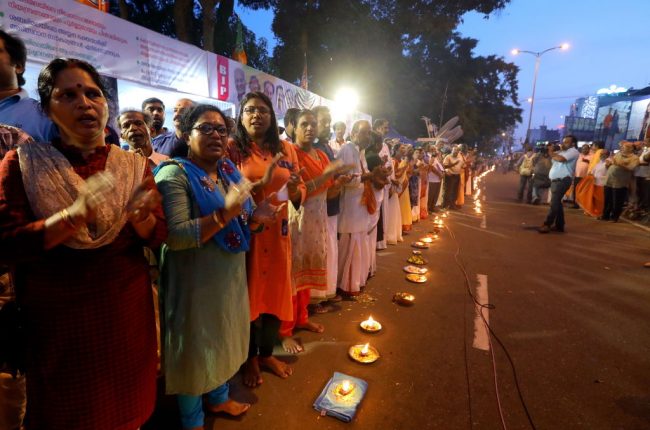 Women protest a Supreme Court of India verdict allowing the entry of women into Sabarimala temple, Dec. 26, 2018 in Thiruvanathapuram, India.