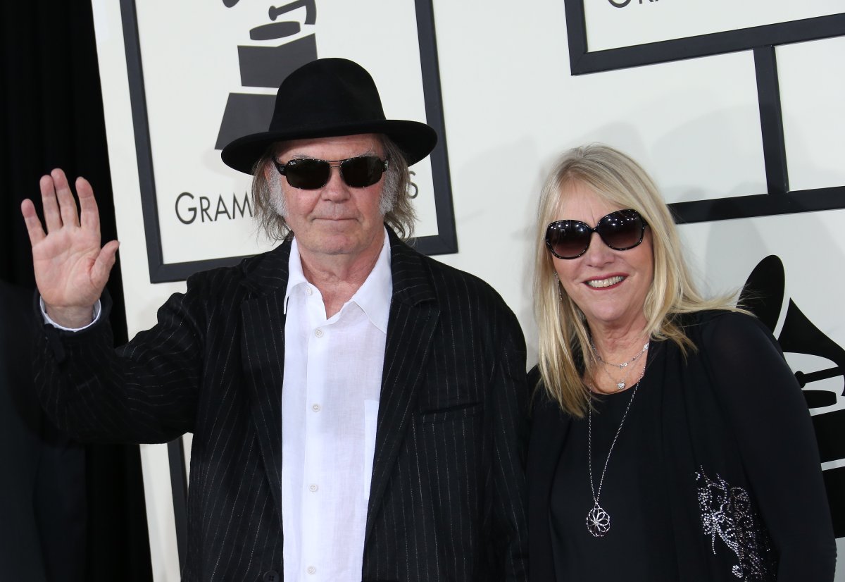 Neil Young (L) and Pegi Young arrive at the 56th Annual GRAMMY Awards at Staples Center on January 26, 2014 in Los Angeles, California. 