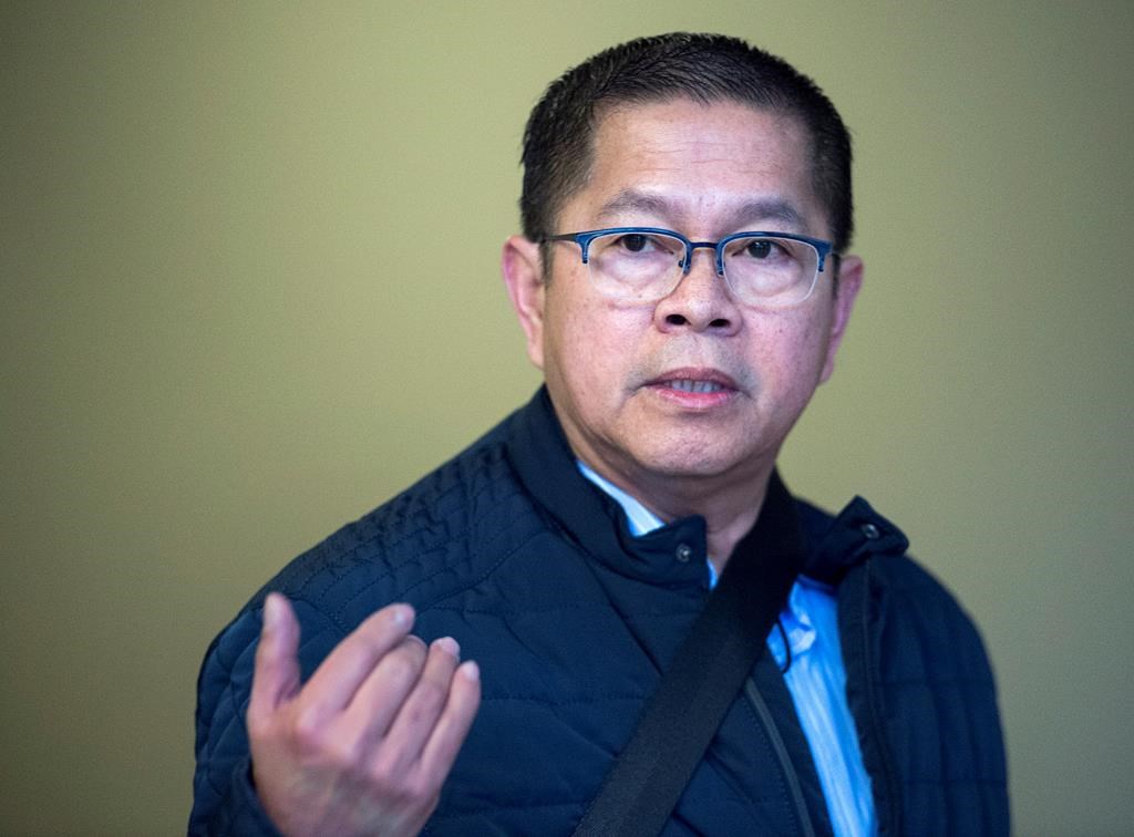 Hector Mantolino, charged with not paying Filipino temporary workers their required wages, arrives at Nova Scotia Supreme Court at his sentencing in Halifax on Friday, Jan. 4, 2019.