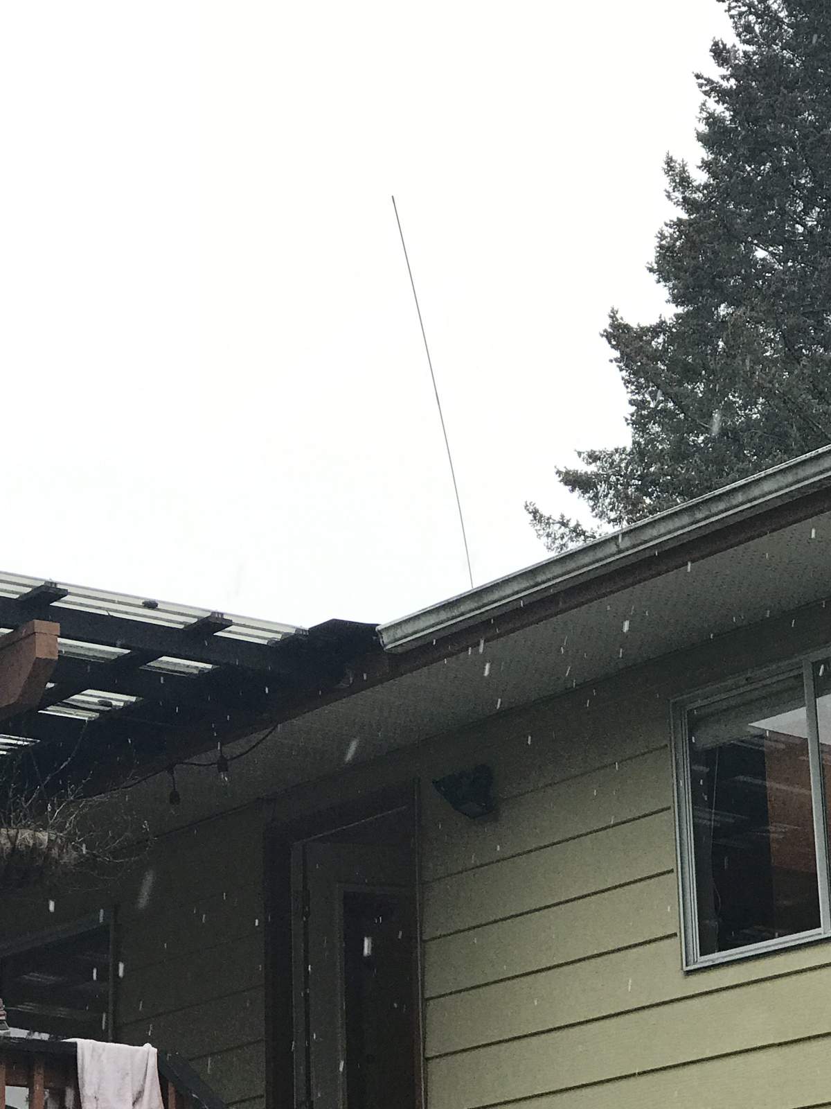 A rod used by forensic ballistics experts to try and determine the direction the bullet came through as it pierced the Fosters’ roof.