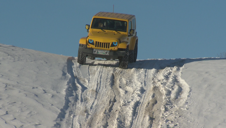 A member of the club preparing to conquer a steep hill.