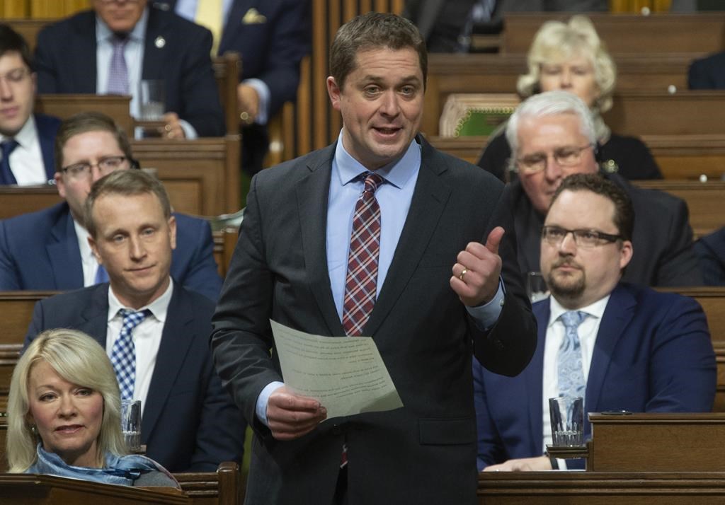 Conservative Leader Andrew Scheer rises during Question Period in the House of Commons, Monday, January 28, 2019 in Ottawa. The federal Liberal party is looking to turn the tables on the Conservatives over so-called cash-for-access fundraisers.
