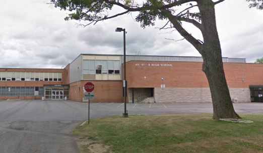 Hamilton police have arrested a 13-year-old boy after he was allegedly seen waving a firearm outside Ancaster High School.
