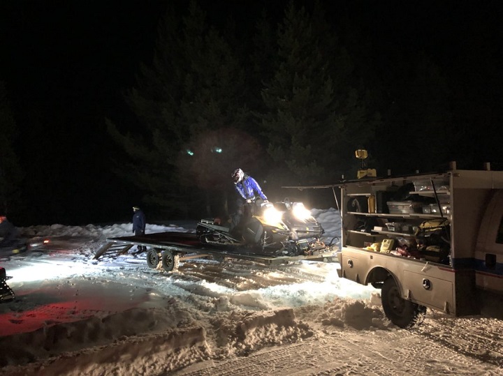 Snowmobiles were used to help rescue two snowboarders who got lost on the backside of Big White on Friday.
