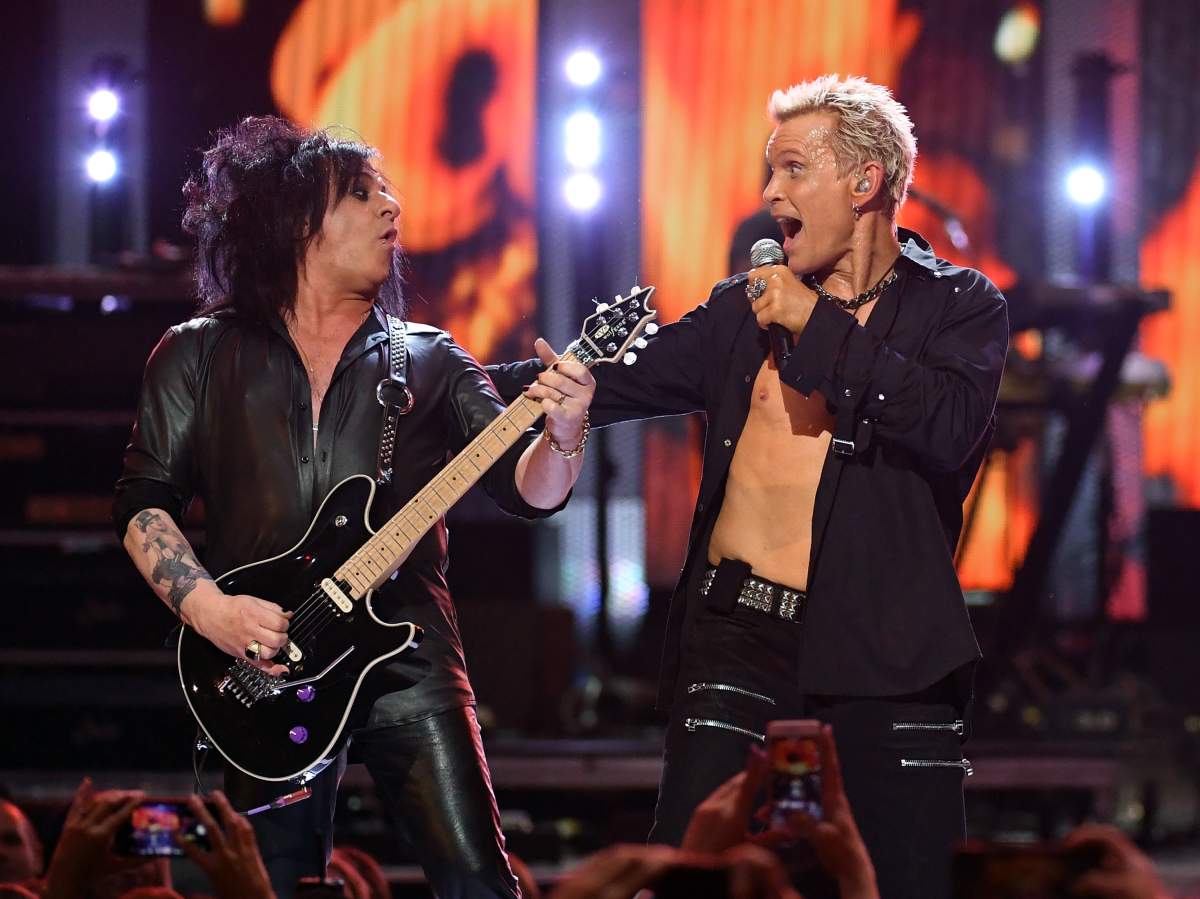 Steve Stevens (L) and singer Billy Idol perform at the 2016 iHeartRadio Music Festival at T-Mobile Arena on Sept. 23, 2016, in Las Vegas, Nev.