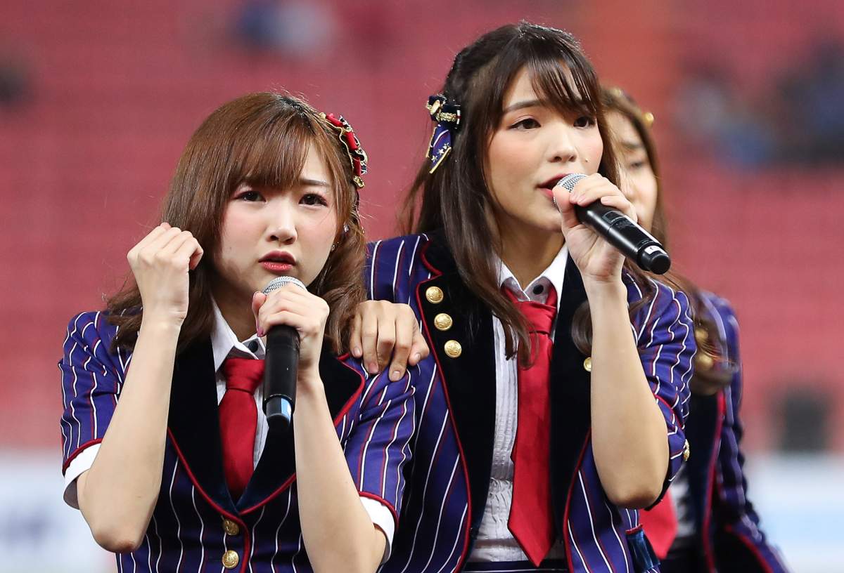 (L), Kaimook and Orn of BNK48 perform at Rajamangala National Stadium on March 22, 2018, in Bangkok, Thailand.