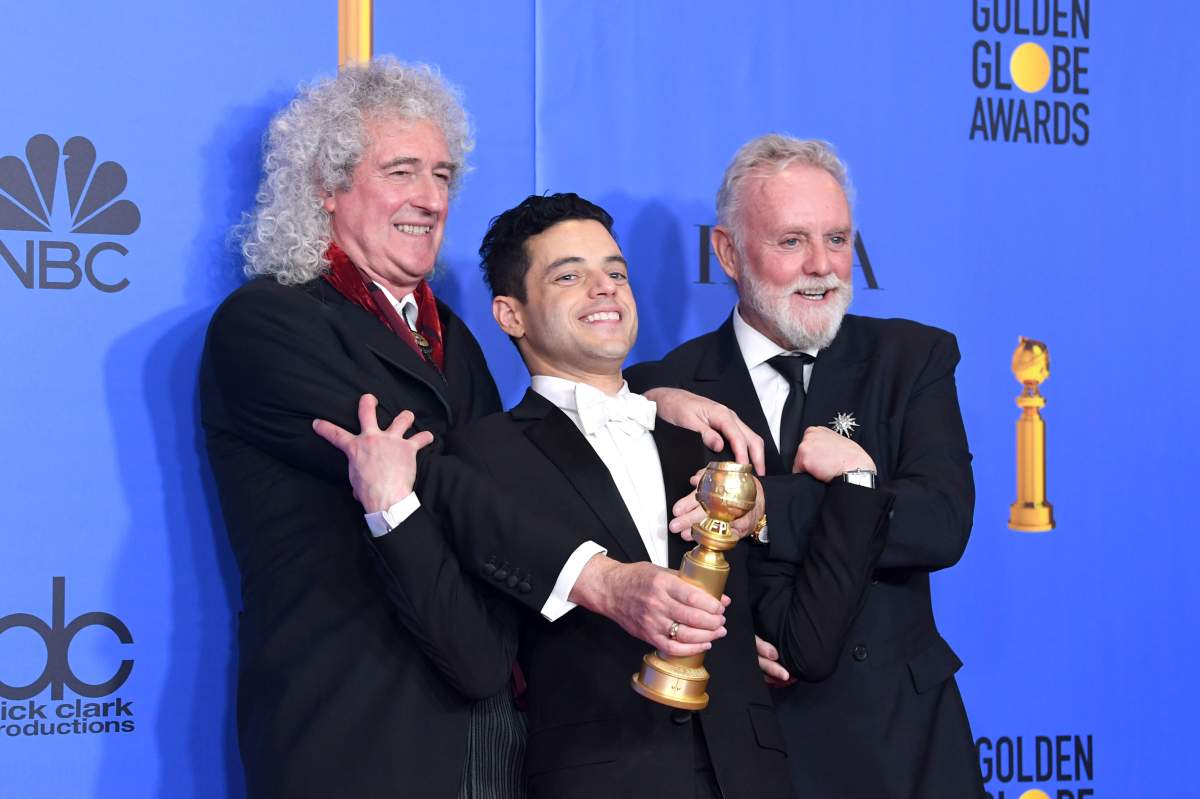Rami Malek (C) with Brian May (L) and Roger Taylor pose during the Golden Globe Awards at The Beverly Hilton Hotel on Jan. 6, 2019, in Beverly Hills, Calif.