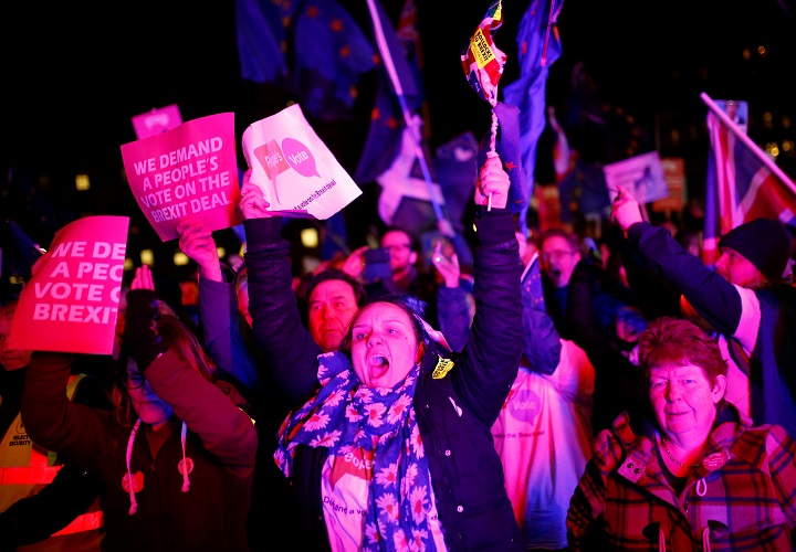 Protesters react after the result was announced on Prime Minister Theresa May’s Brexit deal, outside the Houses of Parliament in London, Britain, January 15, 2019.