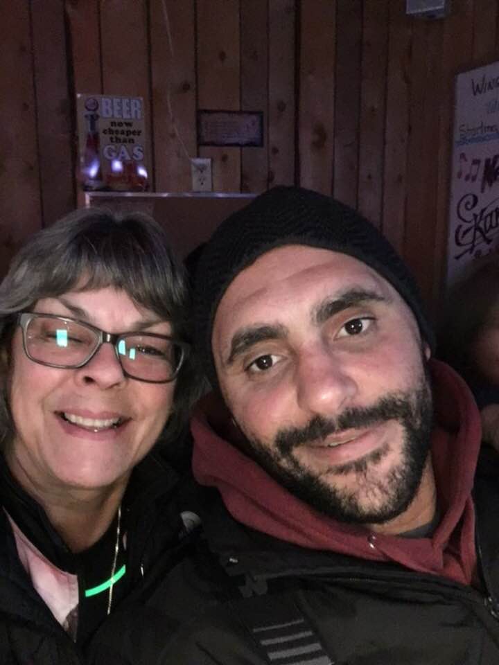 A patron at the Petersfield Motor Inn bar posing for a picture with Dustin Byfuglien on New Year’s Eve.