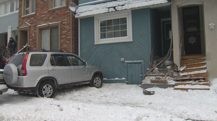 Toronto police say one person was injured after crashing a car into a home in the city's east end. 