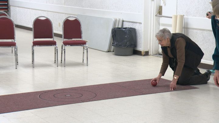 Olive Epp carpet bowling at Nutana Legion.