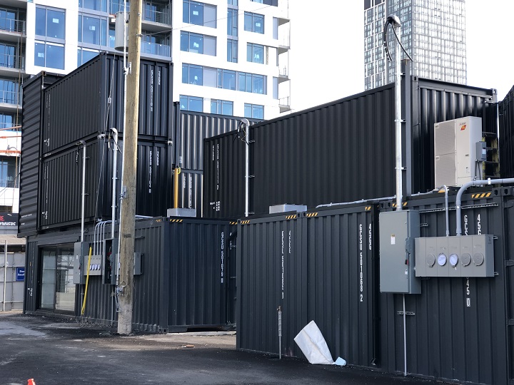 These shipping containers will soon play host to a variety of restaurants, bars, and shops as a part of the new "Stackt" market.