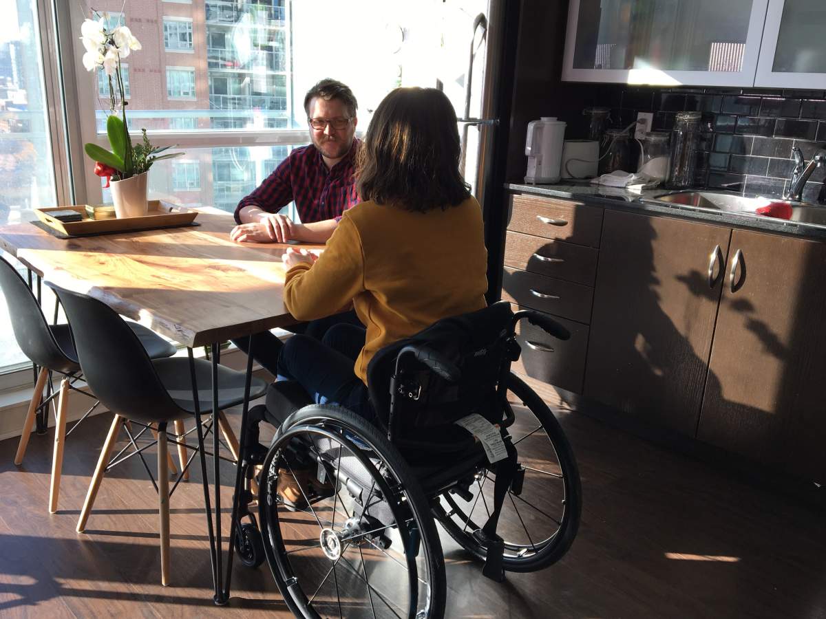 Danielle Kane and Jerry Pinksen speak at their apartment in the west end of Toronto.