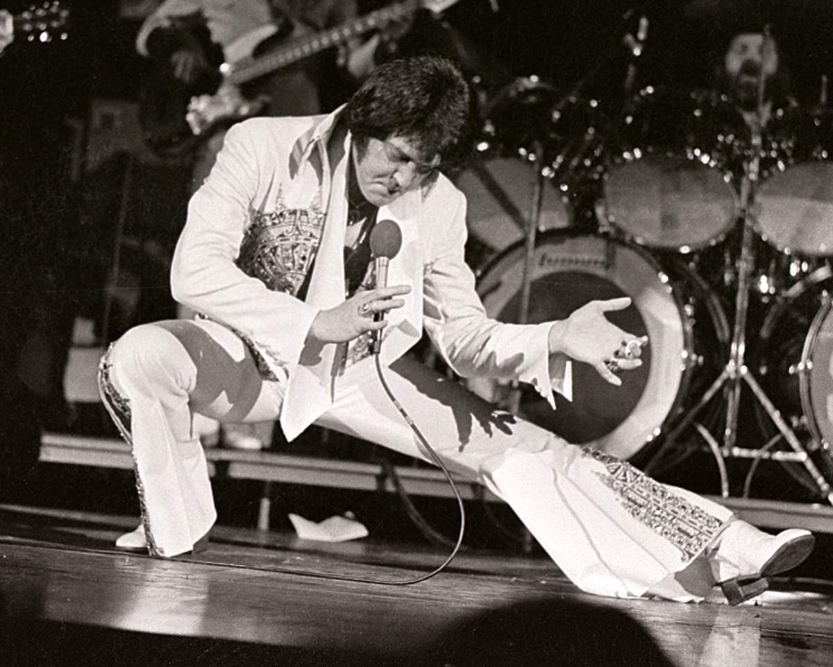 Elvis Presley performs in concert at the Milwaukee Arena on April 27, l977, in Milwaukee, Wis.