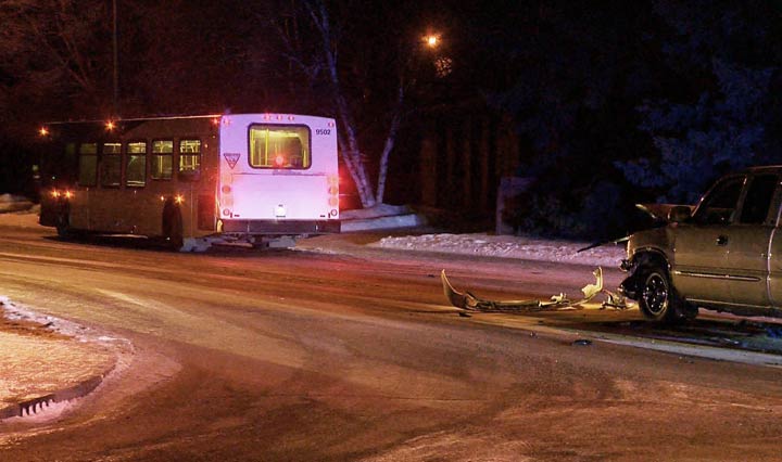 Police say a driver jumped out of the moving truck before it collided with a Saskatoon Transit bus.