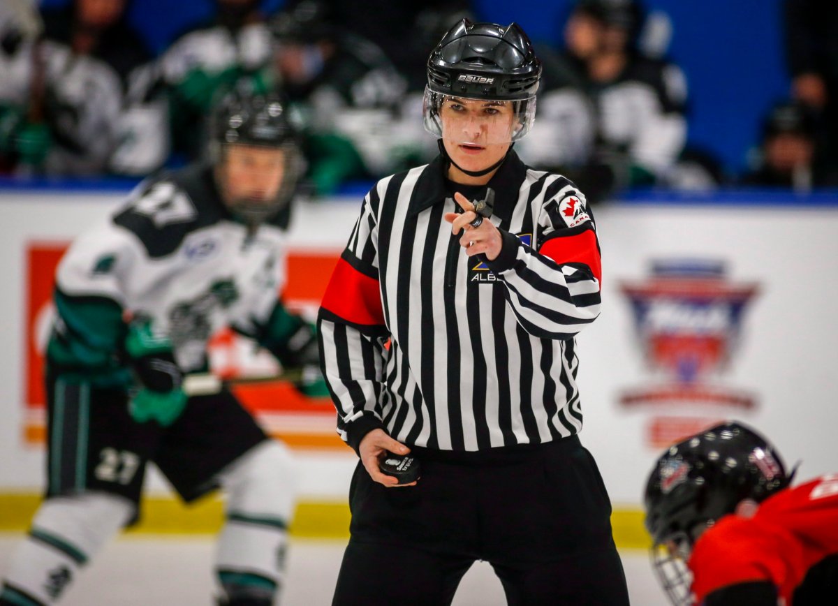 Referee Erica Holmes officiates a game at the Mac's Tournament in Calgary, Alta., Thursday, Dec. 27, 2018. 