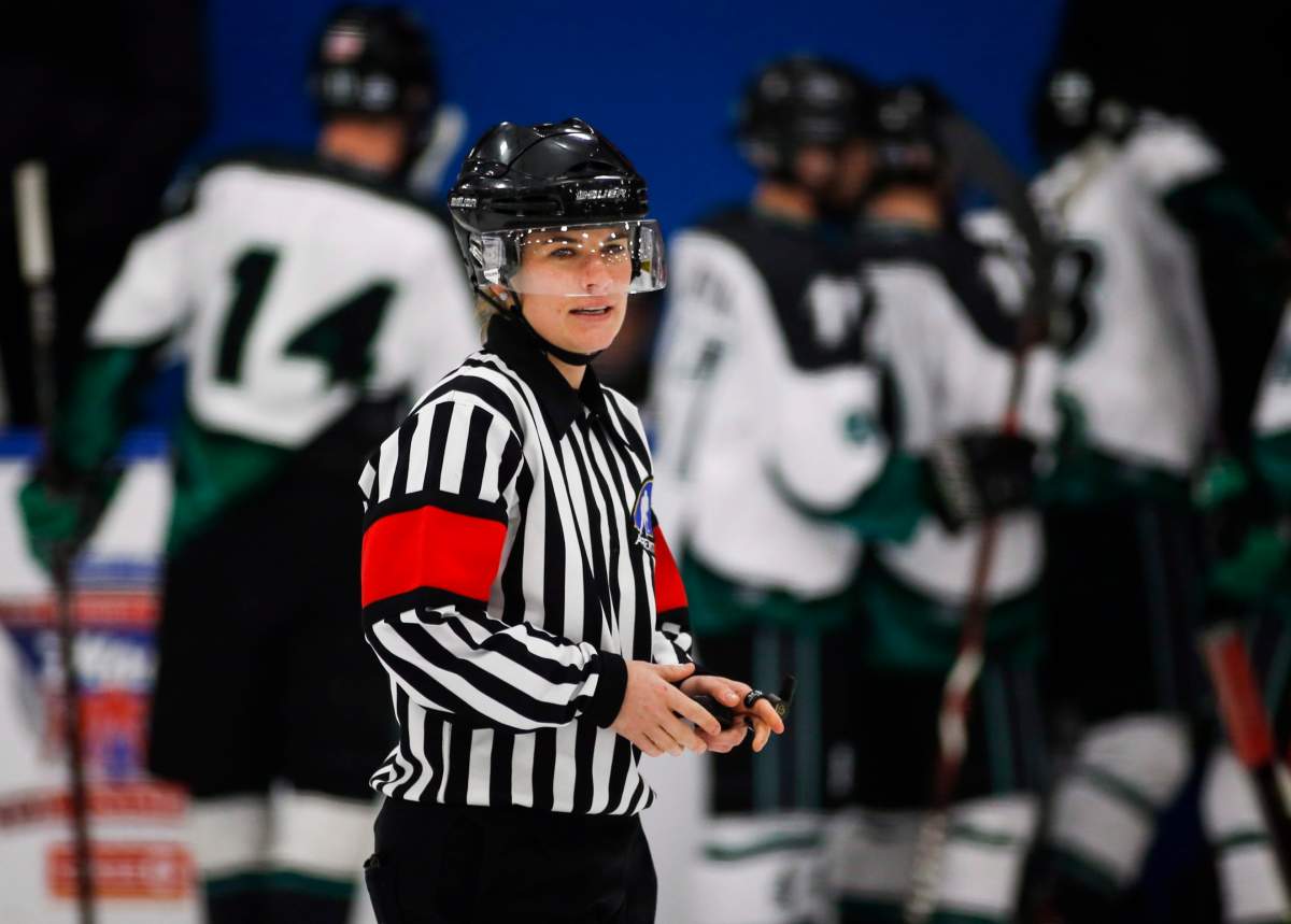 Referee Erica Holmes officiates a game at the Mac’s Tournament in Calgary, Alta., Thursday, Dec. 27, 2018.