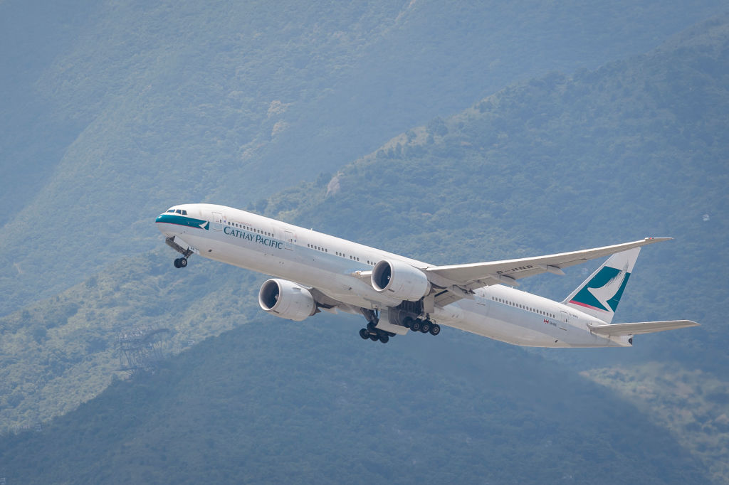 A Boeing 777-367(ER) passenger plane belonging to the Cathay Pacific taking off at Hong Kong International Airport on August 08 2018 in Hong Kong, Hong Kong. 