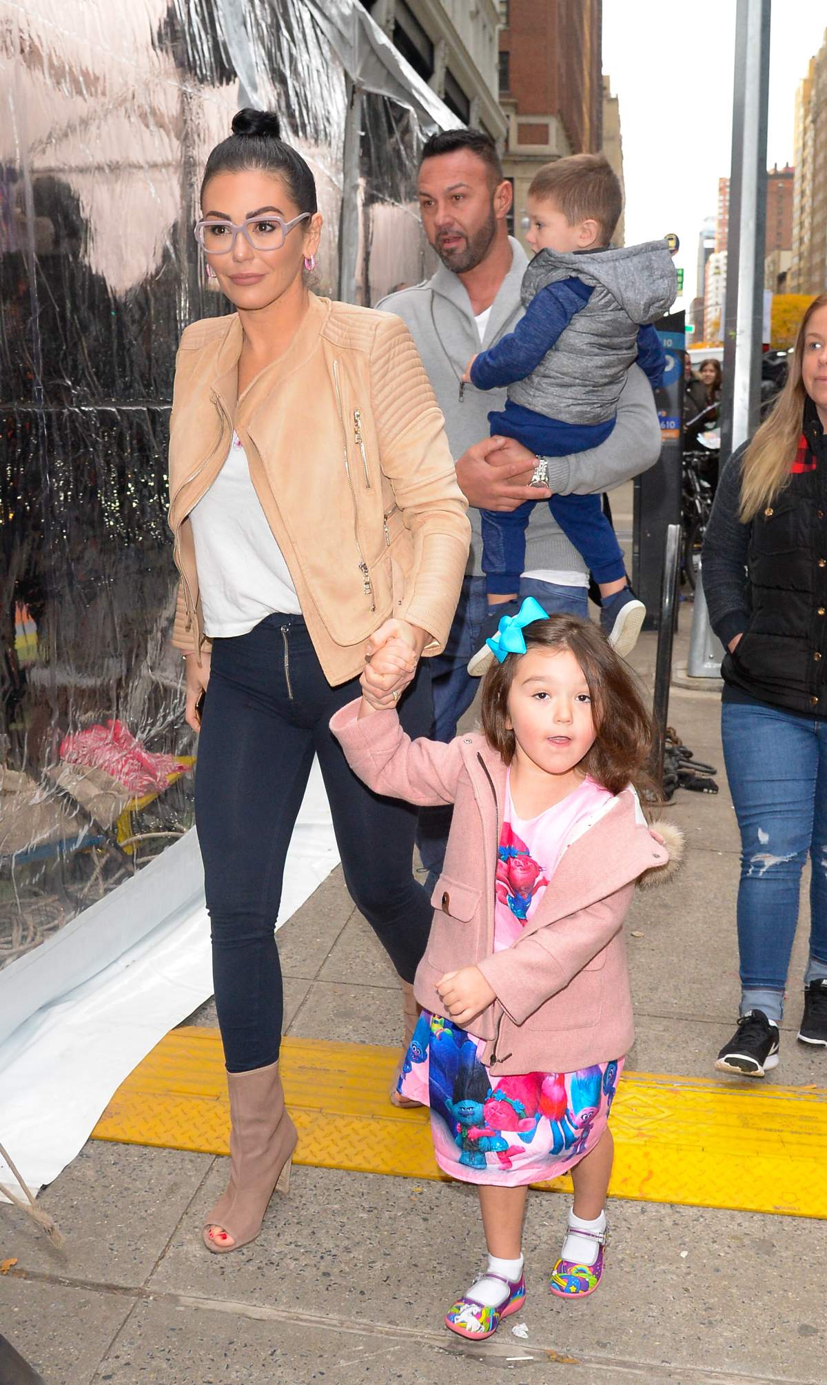 Roger Mathews, Jenni ‘JWoww’ Farley and Meilani Mathews are seen walking Midtown on Nov. 14, 2018, in New York City. (Photo by Raymond Hall/GC Images)