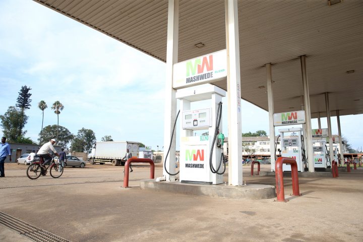 A cyclist rides past an deserted service station in the high density suburb of Mbare,Harare, Zimbabwe, 16 January 2019.