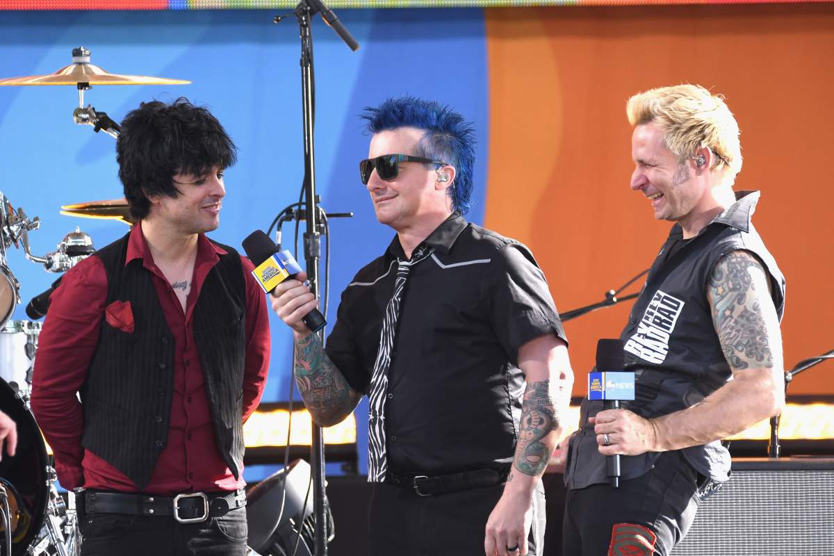 (L-R) Billie Joe Armstrong, Tré Cool and Mike Dint onstage on ‘Good Morning America’ at Rumsey Field in Central Park on May 19, 2017 in New York City.