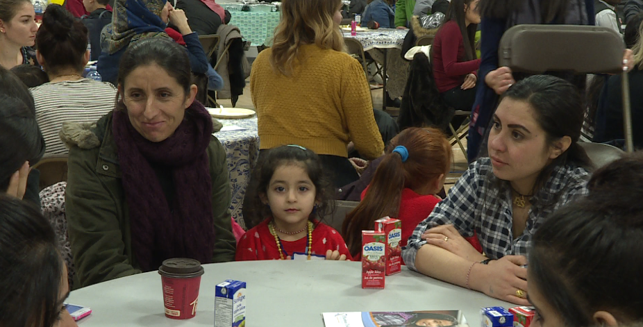 One of many families present at the grand opening of Winnipeg’s new welcoming hub.