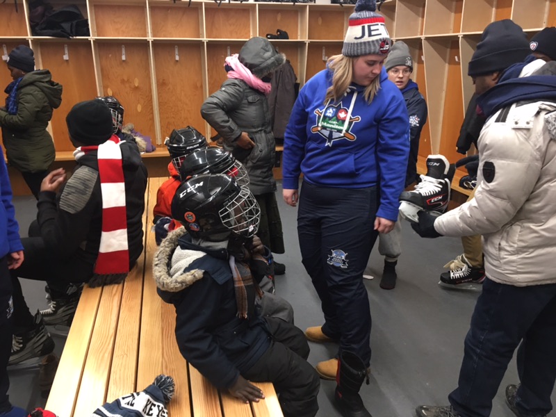 Kids get ready to step out on the ice for the first time