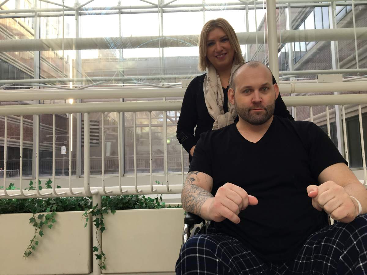 Former mixed martial arts fighter Victor Valimaki –seen here with longtime friend Terry Kopp — is recovering from a rare neurological condition at University of Alberta. Hopsital.