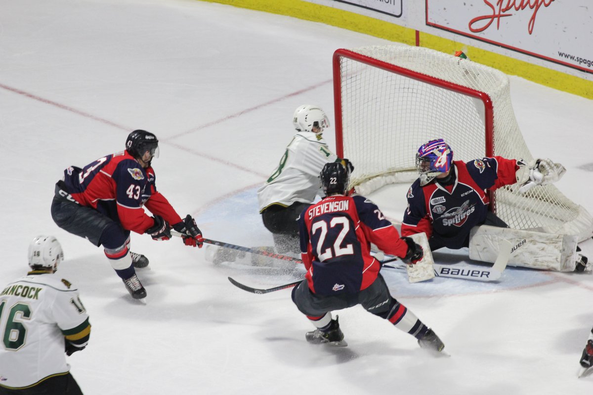 London Knights forward Liam Foudy goes hard to the net and scores the eventual game-winning goal in a 7-3 victory over the Spitfires on Jan. 24, 2019.