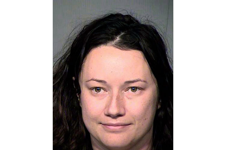 This undated file booking photo provided by the Maricopa County Sheriff's Office in Arizona shows Jacqueline Claire Ades. 