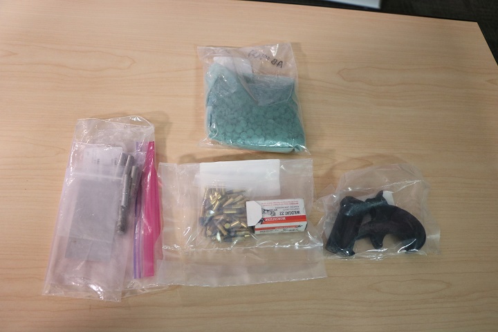 Some of the items seized after a suspected fentanyl lab was shut down in Calgary.