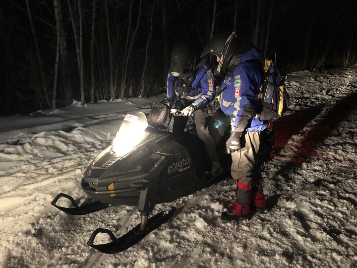 Two overdue snowmobilers were rescued by Central Okanagan Search and Rescue on Thursday night.