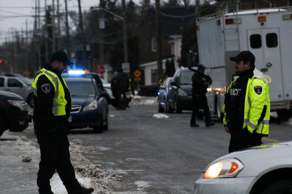 Police conduct an investigation in Kingston, Ont., on Jan. 24, 2019.
