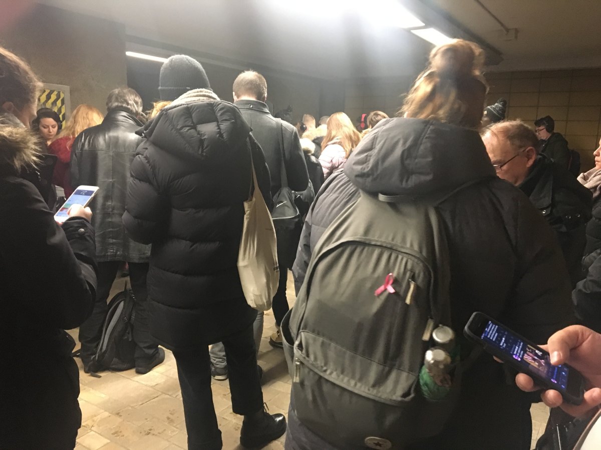 Metro users wait at the Yellow Line's Longueuil station, Weds., Jan. 9, 2019.