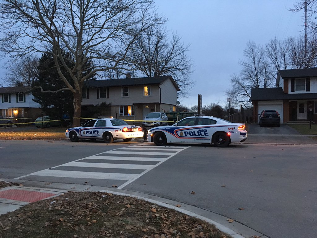 London police cruisers outside the duplex on Notre Dame Drive on Monday morning.