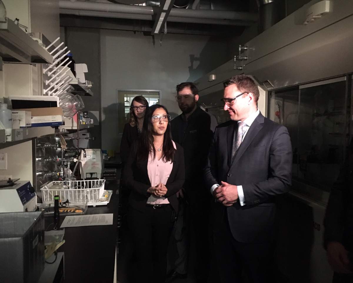 Minister Deron Bilous learns about how one company is trying to turn windows into solar panels.
