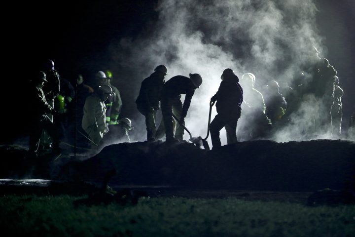 Staff of Pemex, or Petroleos Mexicanos, work in the area of an oil pipeline explosion in Tlahuelilpan, Hidalgo, Mexico, on Saturday, Jan. 19, 2019.