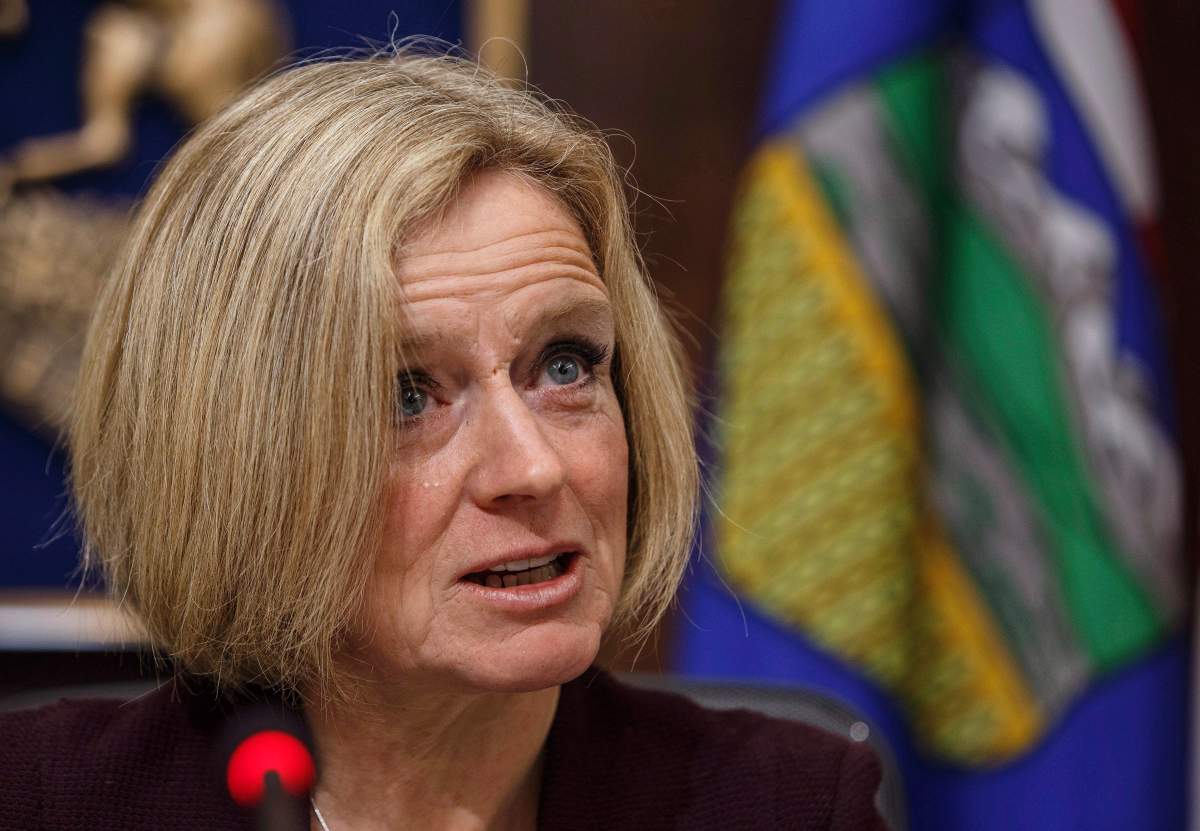 Alberta Premier Rachel Notley speaks to cabinet members about an 8.7 percent oil production cut to help deal with low prices, in Edmonton on Monday December 3, 2018. 