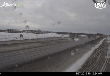 Partially snow covered roads along the QE2 near Red Deer.