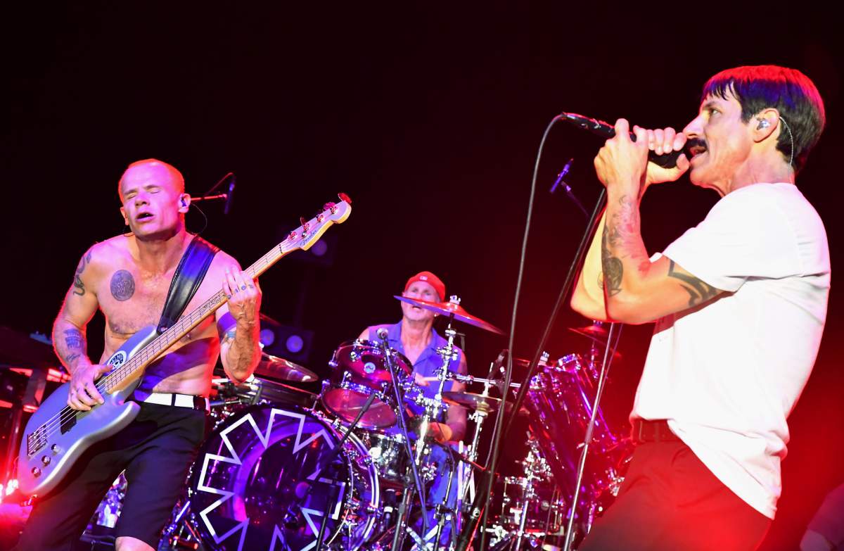 (L-R) Flea, Chad Smith and Anthony Kiedis of Red Hot Chili Peppers perform at Malibu Love Sesh Benefit Concert at the Hollywood Palladium on Jan. 13, 2019, in Hollywood, Calif.