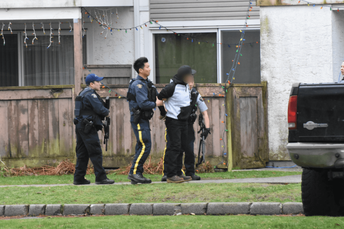 Richmond RCMP arrest a man after a tense, hour-long standoff on Wednesday. Police later recovered a baby, unharmed, from the home. 