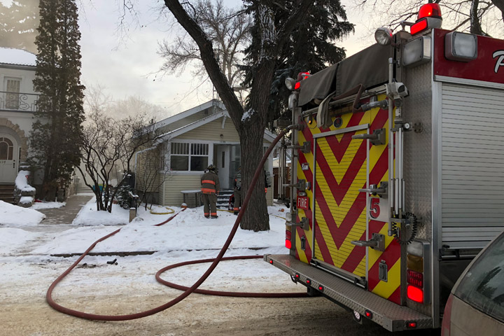 Saskatoon firefighters said smoke was coming from the left side of the bungalow when they arrived.