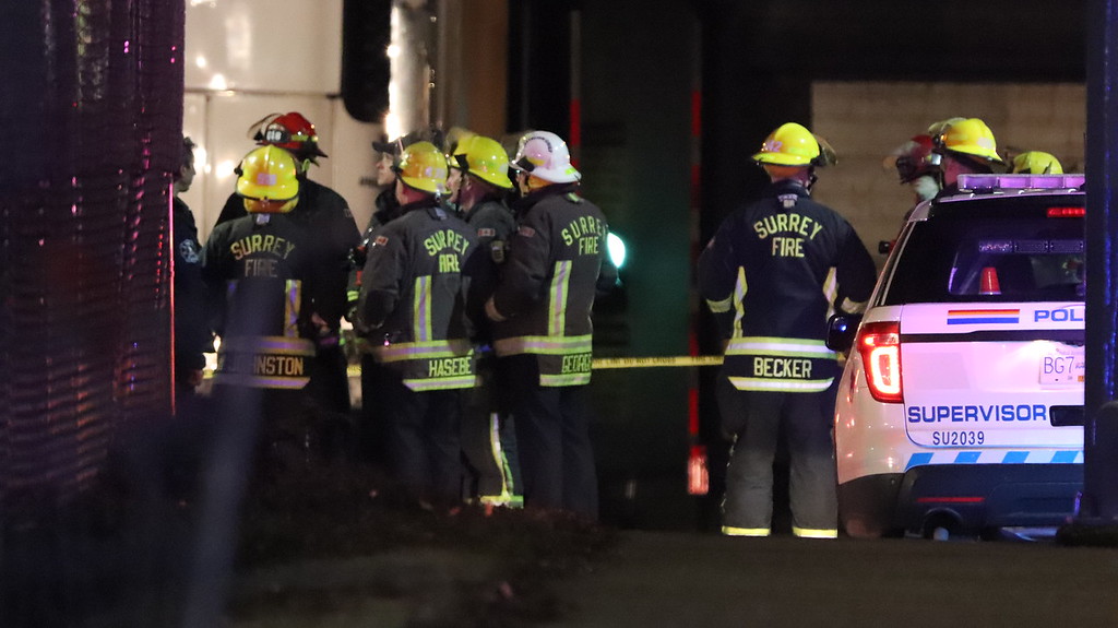 Firefighters attend the scene of an ammonia leak in Surrey early Saturday morning. 