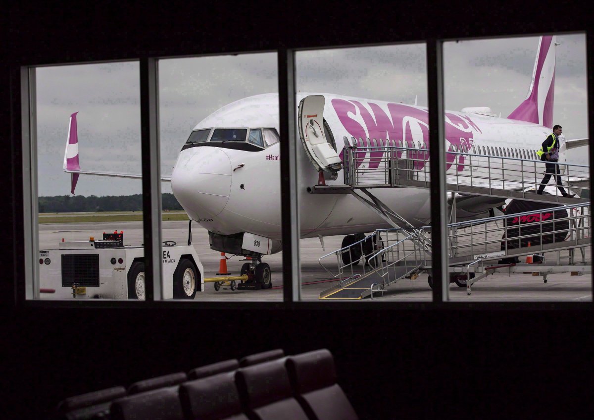 A Swoop Airlines Boeing 737-800 is on display at John C. Munro International Airport in Hamilton, Ont.