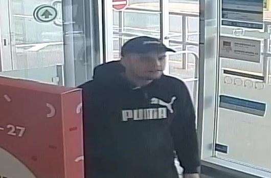 Police are looking to identify this man in connection with a pair of thefts in Cole Harbour. 